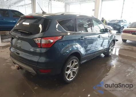 2018 Ford Escape Titanium z USA, uszkodzony, nr VIN 1FMCU9J98JUB73466